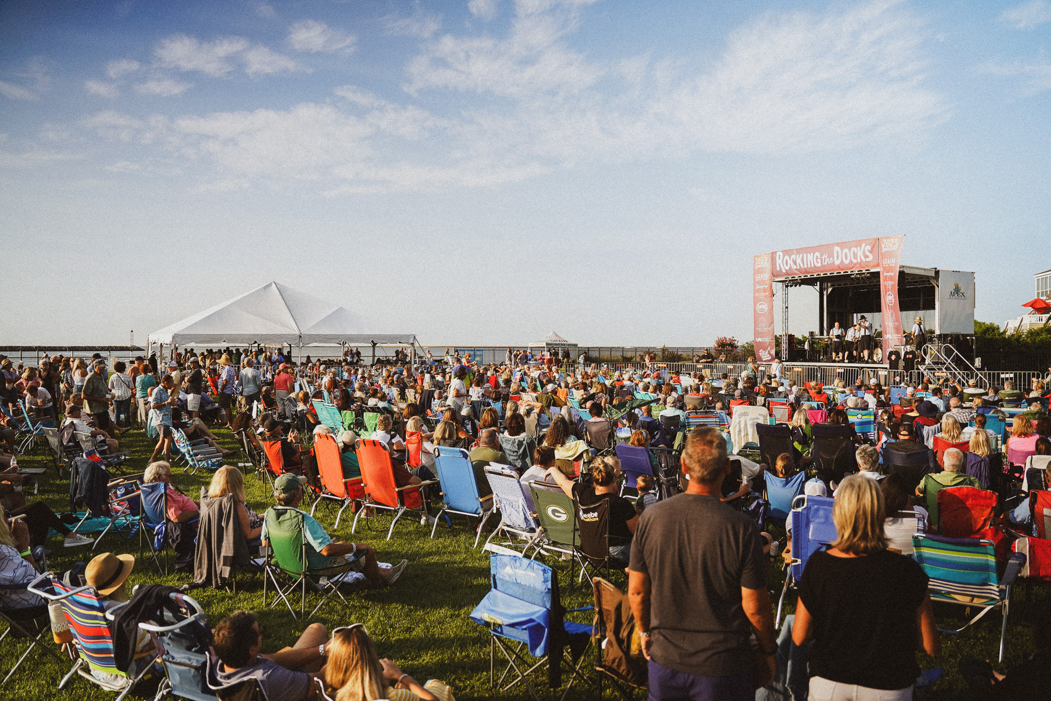 Packed crowds last year enjoying the outdoor concert on the water in Lewes. CREDIT Laine duPont